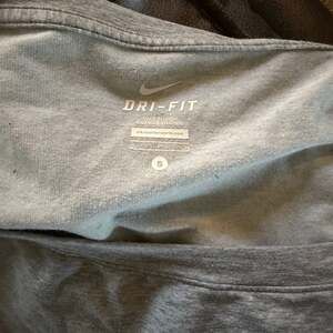 Nike Dri-FIT Women's Gray Short Sleeve T-Shirt